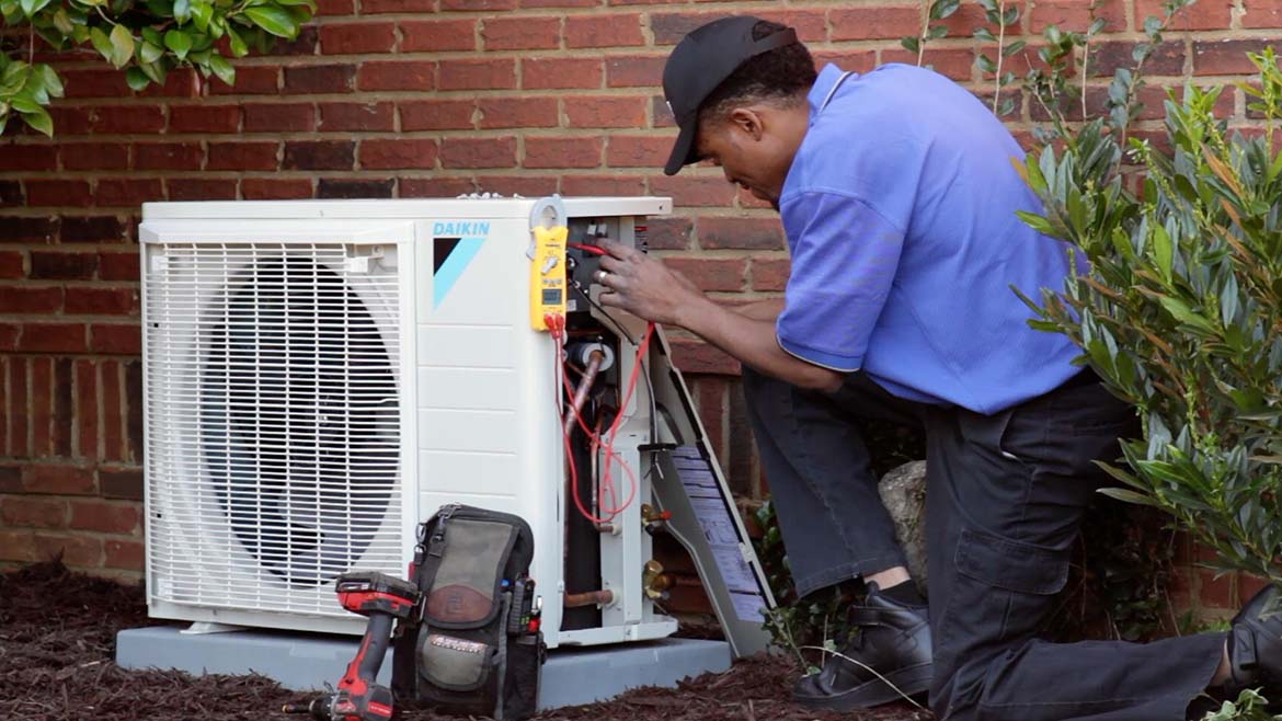 Technician completing an Electrification